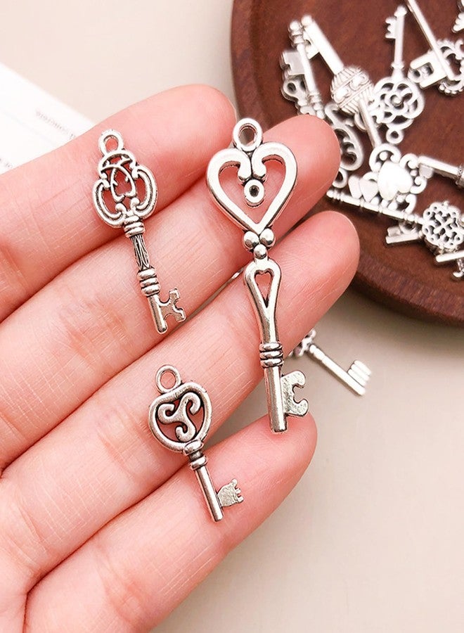 BdelrinQue 31Pcs Silver Small Old Keys, Unique Key Pendant for Necklace and Keychain, Vintage Jewelry Key Charm for DIY Crafts, Assorted Key Shapes Like Heart and Clover, Perfect for Personalized Gifts - Image 5